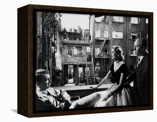 REAR WINDOW, 1954 directed byALFRED HITCHCOCK On the set, Grace Kelly between James Stewart and Alf-null-Framed Stretched Canvas