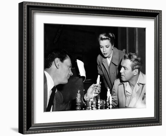 REAR WINDOW, 1954 directed byALFRED HITCHCOCK On the set, Wendell Corey, Grace Kelly and James Stew-null-Framed Photo