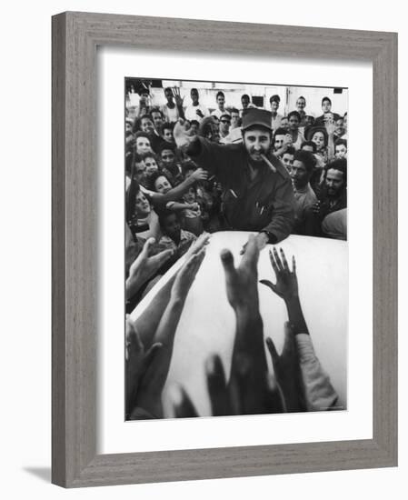 Rebel Leader Fidel Castro Being Cheered by a Village Crowd on His Victorious March to Havana-Grey Villet-Framed Photographic Print