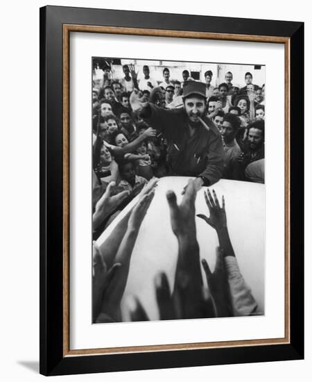 Rebel Leader Fidel Castro Being Cheered by a Village Crowd on His Victorious March to Havana-Grey Villet-Framed Photographic Print