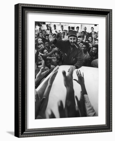 Rebel Leader Fidel Castro Being Cheered by a Village Crowd on His Victorious March to Havana-Grey Villet-Framed Photographic Print