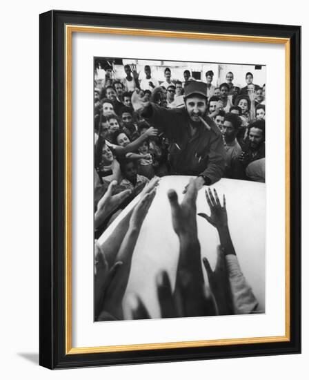 Rebel Leader Fidel Castro Being Cheered by a Village Crowd on His Victorious March to Havana-Grey Villet-Framed Photographic Print