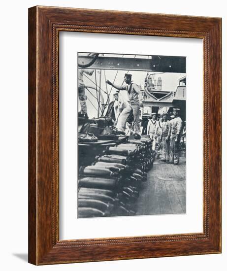 Receiving shells for the naval guns on the deck of a battleship, c1914-Unknown-Framed Photographic Print