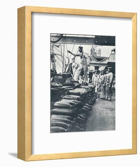 Receiving shells for the naval guns on the deck of a battleship, c1914-Unknown-Framed Photographic Print