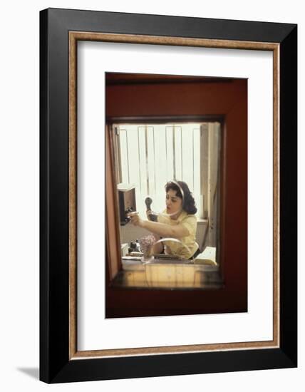 Receptionist Nancy Ricigliano at the Cindy Collins Inc Company, New York, New York, 1960-Walter Sanders-Framed Photographic Print