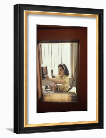 Receptionist Nancy Ricigliano at the Cindy Collins Inc Company, New York, New York, 1960-Walter Sanders-Framed Photographic Print