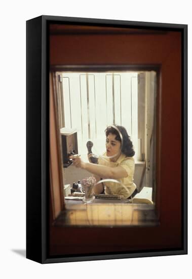 Receptionist Nancy Ricigliano at the Cindy Collins Inc Company, New York, New York, 1960-Walter Sanders-Framed Premier Image Canvas