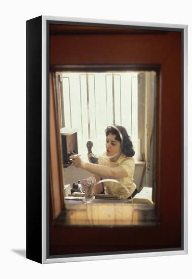 Receptionist Nancy Ricigliano at the Cindy Collins Inc Company, New York, New York, 1960-Walter Sanders-Framed Premier Image Canvas