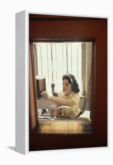 Receptionist Nancy Ricigliano at the Cindy Collins Inc Company, New York, New York, 1960-Walter Sanders-Framed Premier Image Canvas