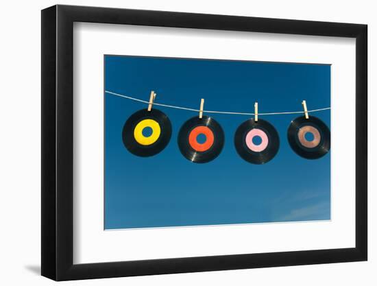 Record on A Clotheline-flippo-Framed Photographic Print