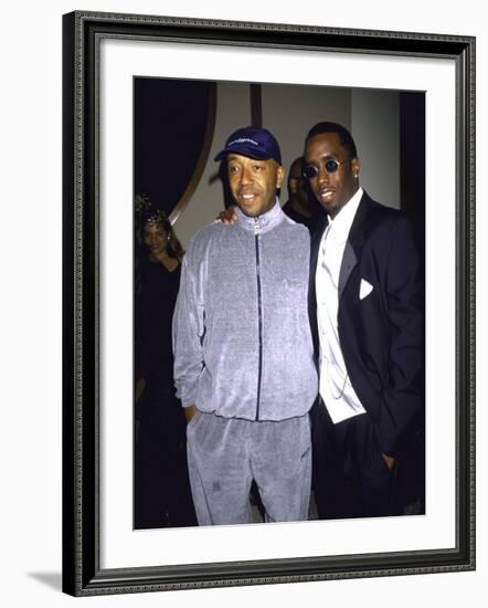 Recording Mogul Russell Simmons and Rap Artist Sean "Puffy" Combs-Dave Allocca-Framed Premium Photographic Print