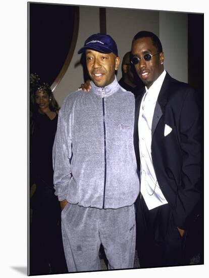 Recording Mogul Russell Simmons and Rap Artist Sean "Puffy" Combs-Dave Allocca-Mounted Premium Photographic Print