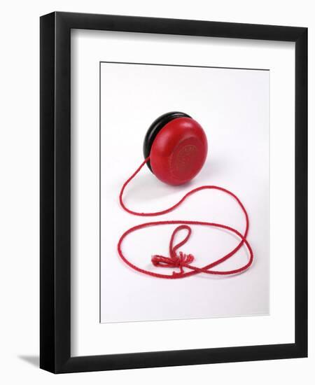 Red and Black Yoyo-null-Framed Photographic Print