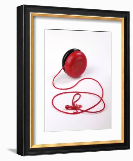 Red and Black Yoyo-null-Framed Photographic Print