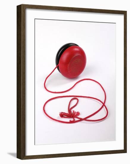 Red and Black Yoyo-null-Framed Photographic Print