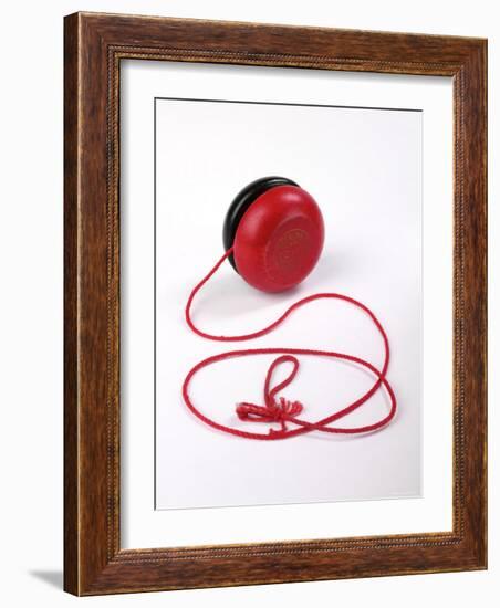 Red and Black Yoyo-null-Framed Photographic Print