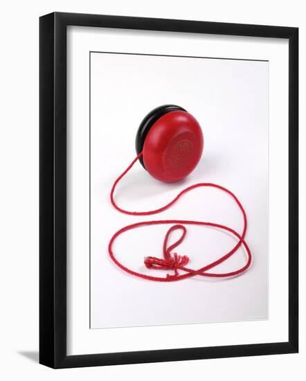 Red and Black Yoyo-null-Framed Photographic Print