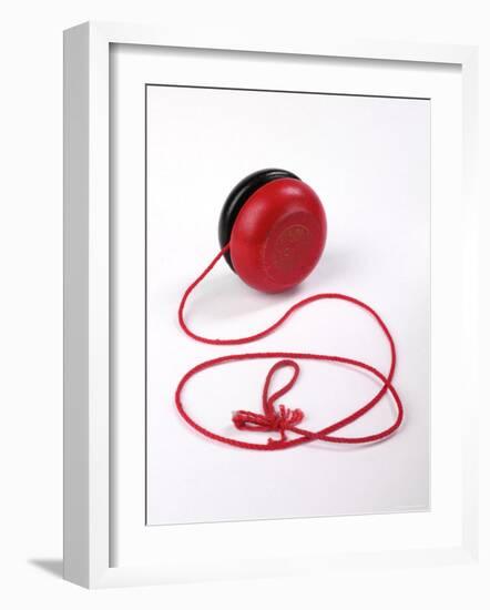 Red and Black Yoyo-null-Framed Photographic Print