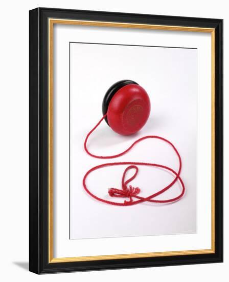 Red and Black Yoyo-null-Framed Photographic Print