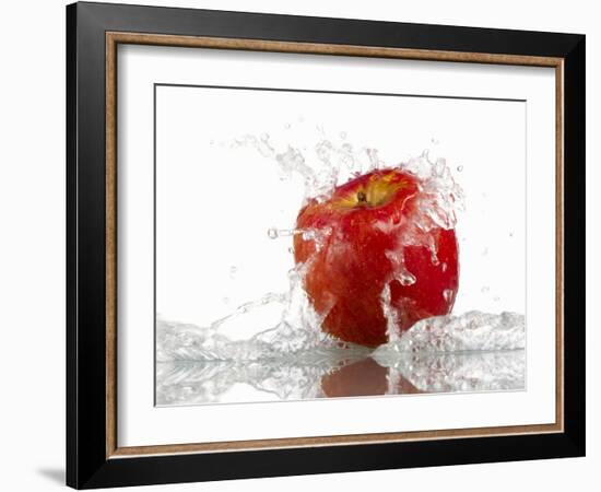 Red Apple with Splashing Water-Michael Löffler-Framed Photographic Print