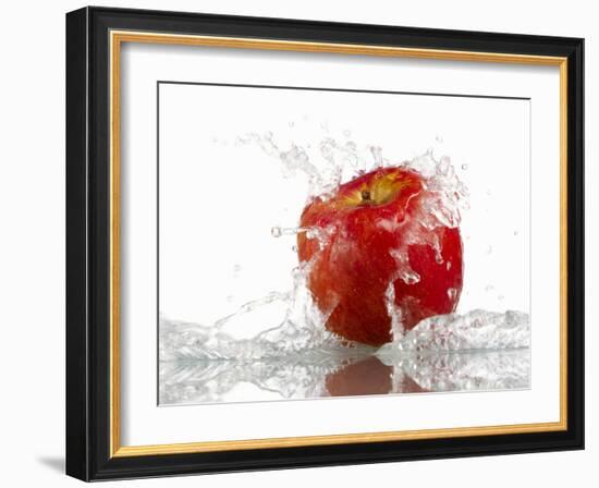 Red Apple with Splashing Water-Michael Löffler-Framed Photographic Print