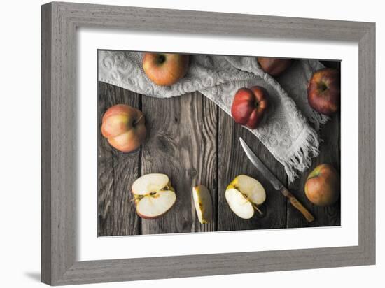 Red Apples and Apple Halves on a Wooden Table Horizontal-Denis Karpenkov-Framed Photographic Print