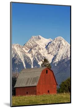 Red Barn Sits Below Mcdonald Peak in the Mission Valley, Montana, Usa-Chuck Haney-Mounted Photographic Print