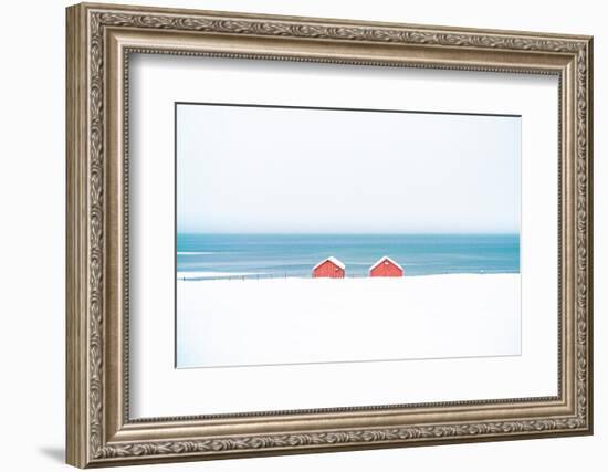 Red cabins in the snow overlooking the frozen sea, Troms county, Norway, Scandinavia, Europe-Roberto Moiola-Framed Photographic Print