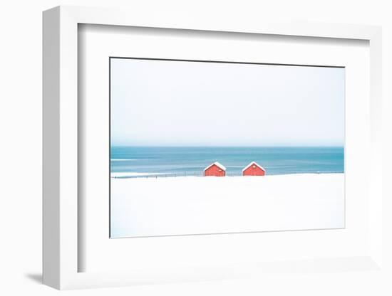 Red cabins in the snow overlooking the frozen sea, Troms county, Norway, Scandinavia, Europe-Roberto Moiola-Framed Photographic Print