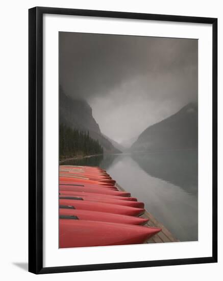 Red Canoes on Lake Louise, Banff National Park, Alberta, Canada-Walter Bibikow-Framed Photographic Print