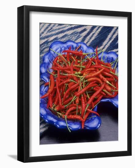 Red Chili Peppers in a Blue Bowl-Alberto Cassio-Framed Photographic Print