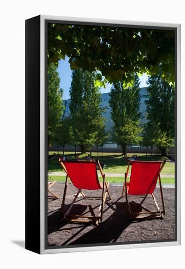 Red Deck Chairs-Felipe Rodriguez-Framed Premier Image Canvas