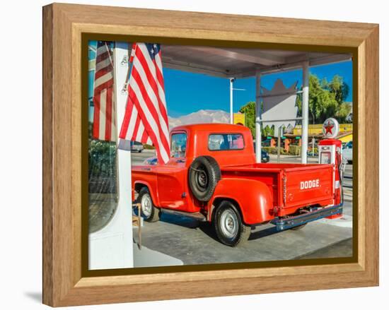 Red Dodge Pickup truck parked in front of vintage gas station in Santa Paula, California-null-Framed Premier Image Canvas