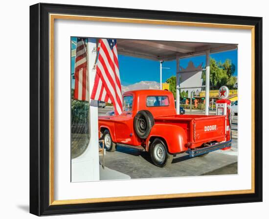 Red Dodge Pickup truck parked in front of vintage gas station in Santa Paula, California-null-Framed Photographic Print