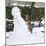 Red Fox Climbing Up Snowman-null-Mounted Photographic Print