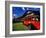 Red Jammer Buses Parked in Front of Glacier Park Lodge in East Glacier, Montana, USA-Chuck Haney-Framed Photographic Print