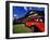 Red Jammer Buses Parked in Front of Glacier Park Lodge in East Glacier, Montana, USA-Chuck Haney-Framed Photographic Print