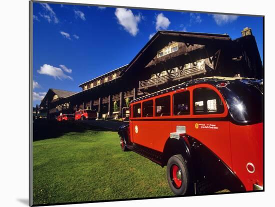 Red Jammer Buses Parked in Front of Glacier Park Lodge in East Glacier, Montana, USA-Chuck Haney-Mounted Photographic Print