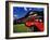 Red Jammer Buses Parked in Front of Glacier Park Lodge in East Glacier, Montana, USA-Chuck Haney-Framed Photographic Print