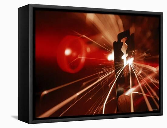 Red Laser Light Focused Through Lens Blasts Pin Point Hole Through Razor in Thousandth of a Second-Fritz Goro-Framed Premier Image Canvas