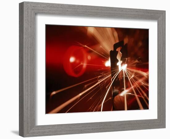 Red Laser Light Focused Through Lens Blasts Pin Point Hole Through Razor in Thousandth of a Second-Fritz Goro-Framed Photographic Print