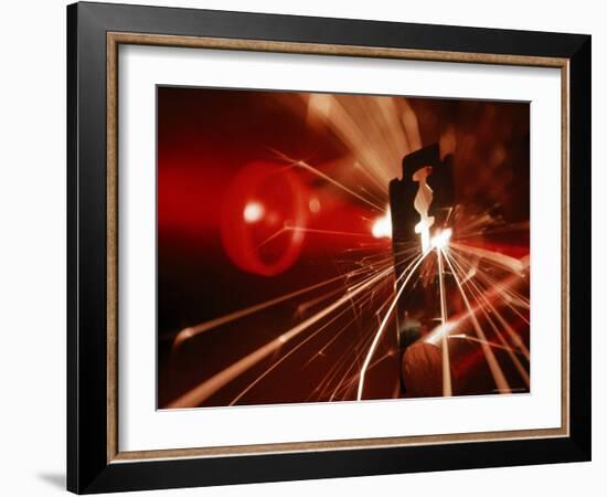 Red Laser Light Focused Through Lens Blasts Pin Point Hole Through Razor in Thousandth of a Second-Fritz Goro-Framed Photographic Print