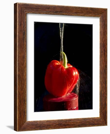 Red pepper is washed by column of water-Charles Bowman-Framed Photographic Print