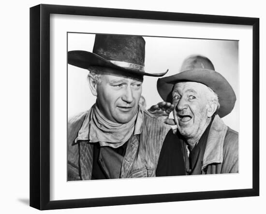 RED RIVER, 1948 directed by HOWARD HAWKS John Wayne and Walter Brennan (b/w photo)-null-Framed Photo