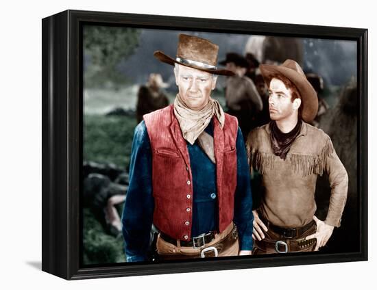 RED RIVER, from left: John Wayne, Montgomery Clift, 1948-null-Framed Stretched Canvas
