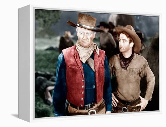 RED RIVER, from left: John Wayne, Montgomery Clift, 1948-null-Framed Stretched Canvas