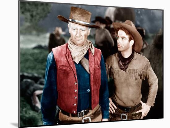 RED RIVER, from left: John Wayne, Montgomery Clift, 1948-null-Mounted Photo