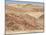 Red Rocky Landscape with Jeep in Distance, Purros Conservancy Wilderness, Kaokoland, Namibia-Kim Walker-Mounted Photographic Print