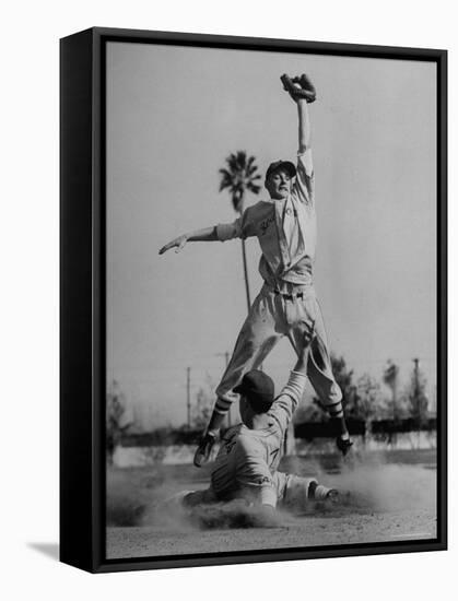 Red Sox's Player in Mid Air Catching the Ball, While an Opposing Player Slides Between His Legs-John Florea-Framed Premier Image Canvas