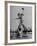 Red Sox's Player in Mid Air Catching the Ball, While an Opposing Player Slides Between His Legs-John Florea-Framed Premium Photographic Print